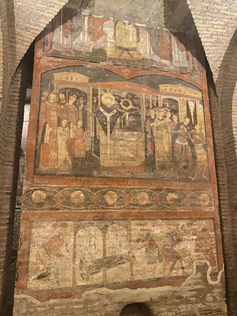 Affresco di San Clemente che celebra la Messa, con pannello inferiore contenente una delle prime testimonianze di scrittura in volgare